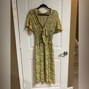 Max Studio Summer dress with bow, ruched bodice, and full skirt, petal sleeves.